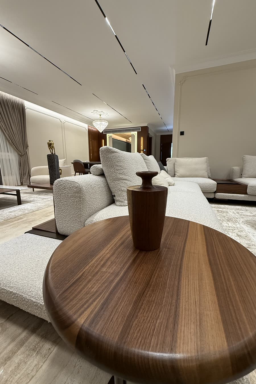 Hyde Park living room with boucle sofa and walnut side table